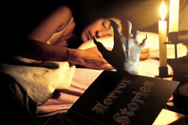 A book of horror stories coming to life as a woman sleeps