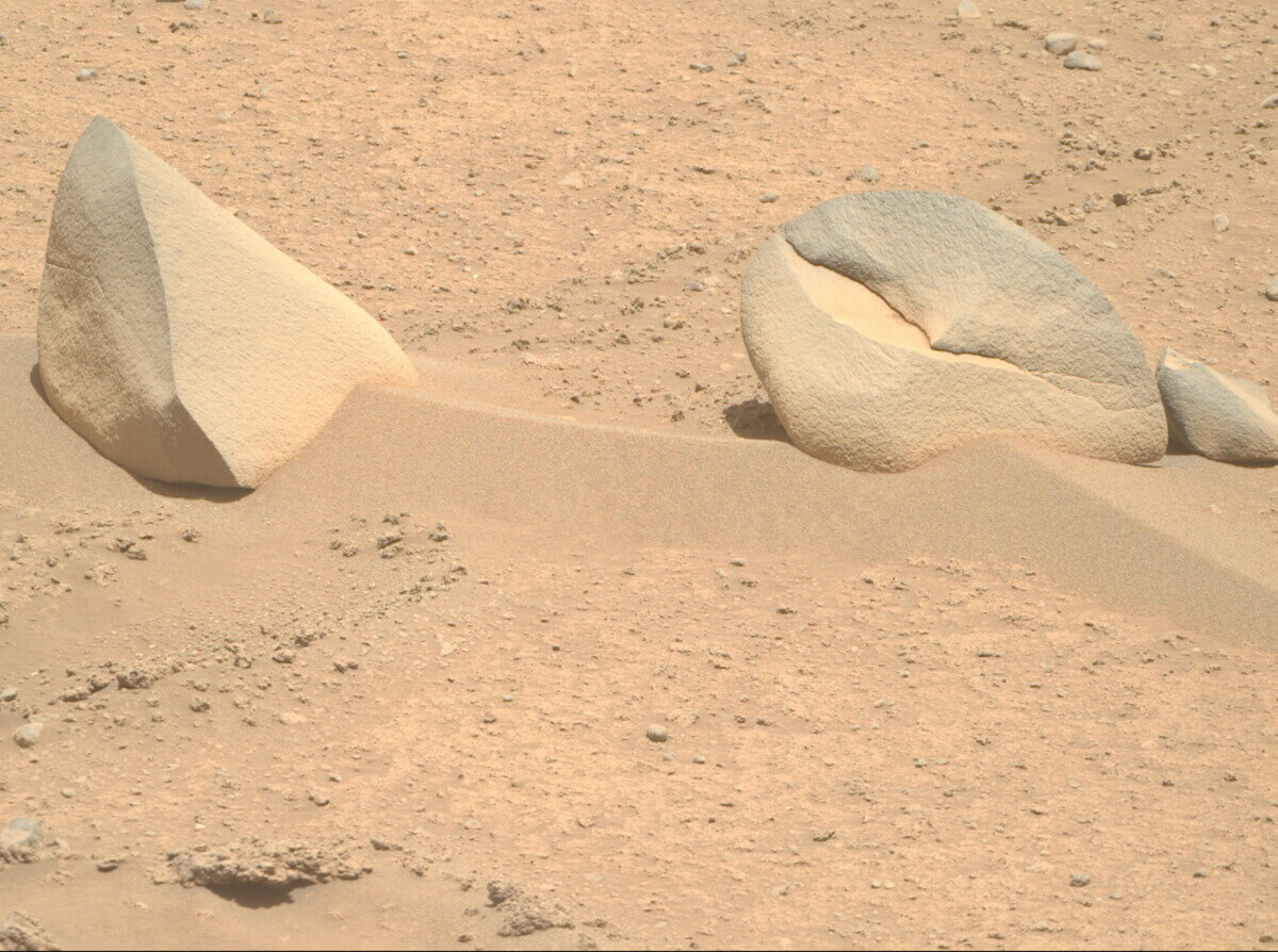 Mars rocks that have been compared to a shark fin and a crab claw.