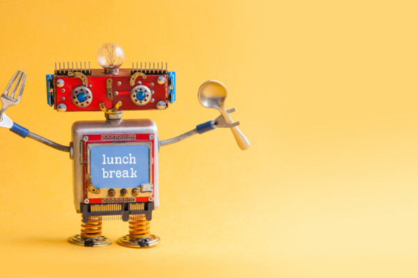Funny robot with fork and spoon in arms