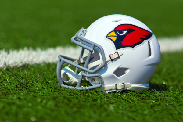 Arizona Cardinals replica helmet on a turf field