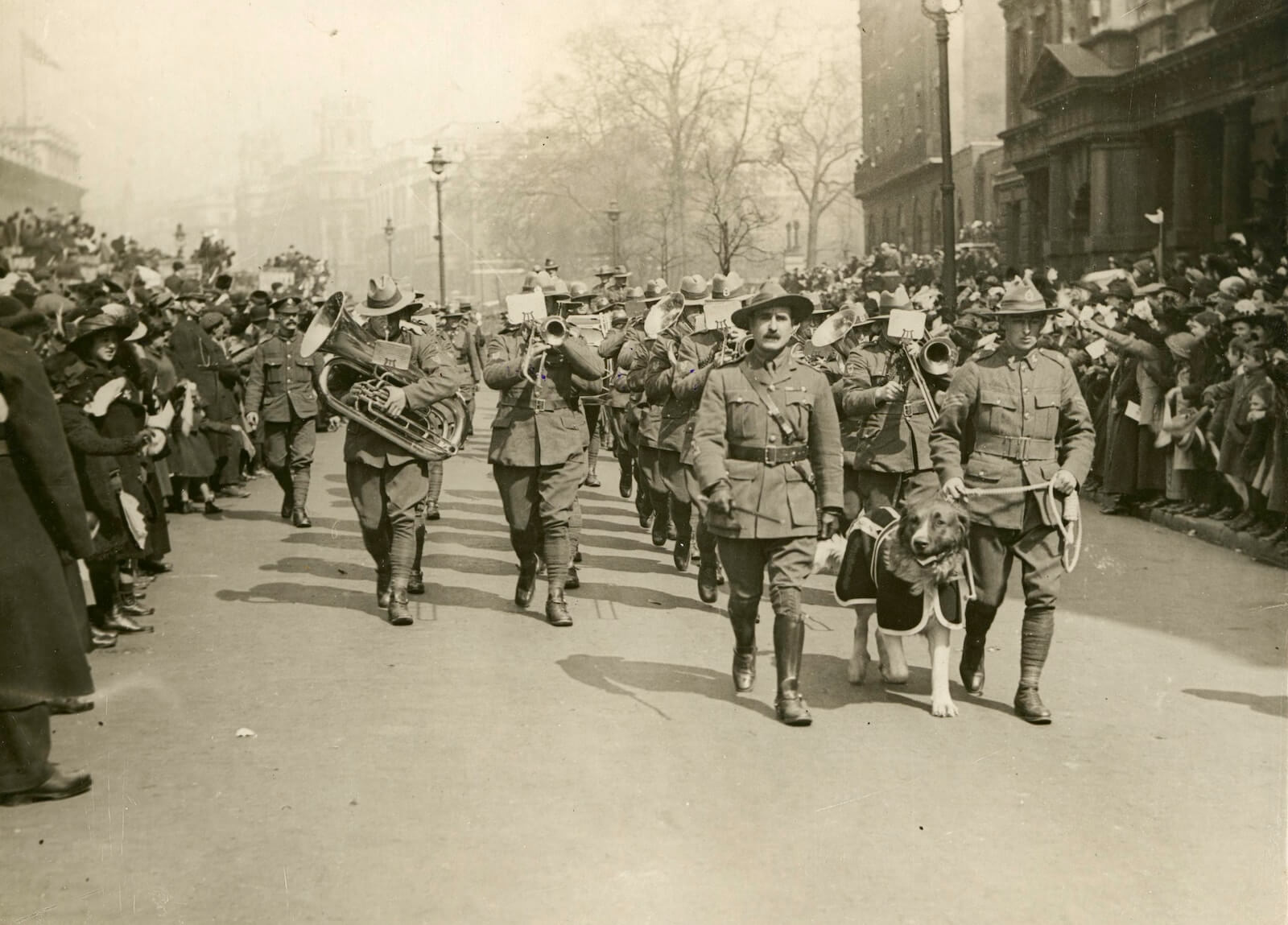 grayscale photography of soldier marching on road