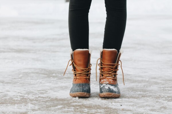 A woman wearing winter boots