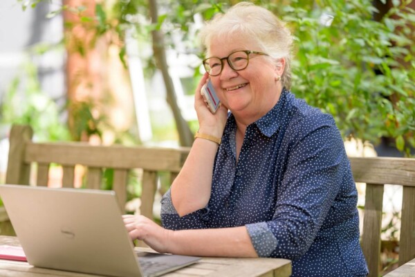 A senior woman on a laptop