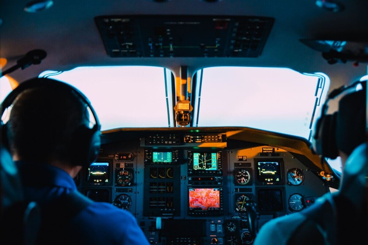 sitting in airplane cockpit