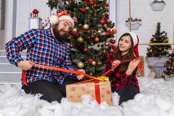 People opening Christmas presents