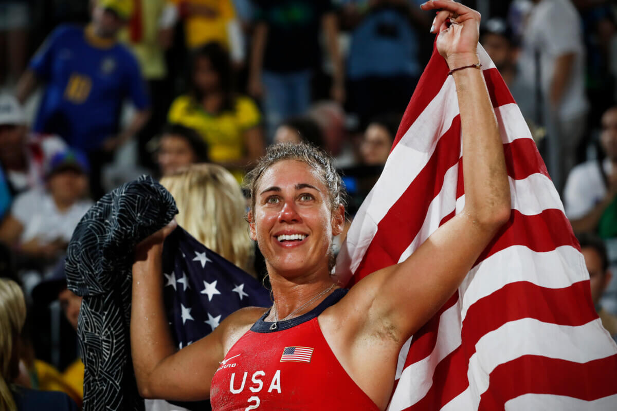 April Ross celebrating her bronze victory with Kerri Walsh Jennings at the 2016 Olympics