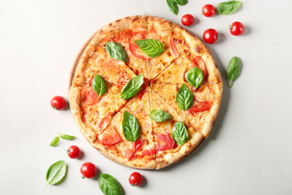Basil and tomato pizza