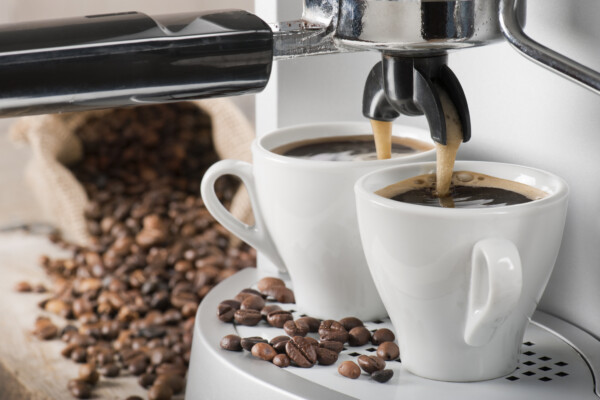 Coffee machine brewing two cups