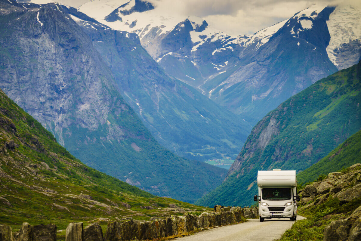 RV driving the scenic route through mountains