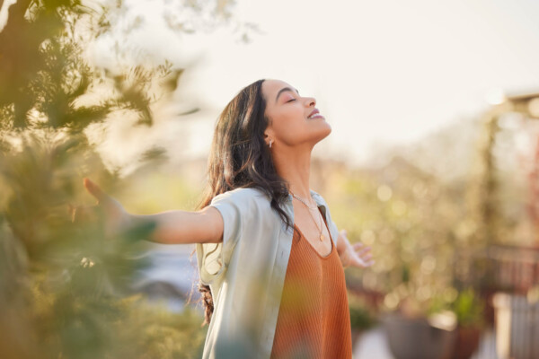 Woman taking a breath of fresh air outside
