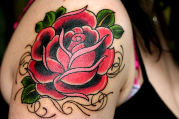 Rose tattoo on a woman's arm