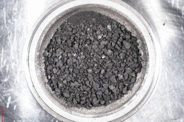 Bits of samples collected from asteroid Ryugu.