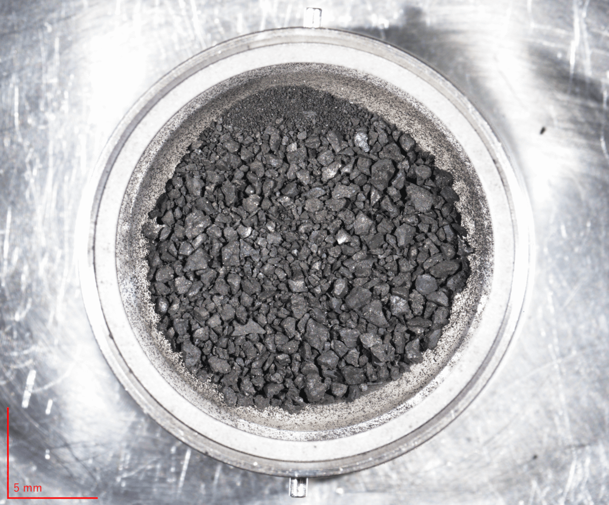 Bits of samples collected from asteroid Ryugu.