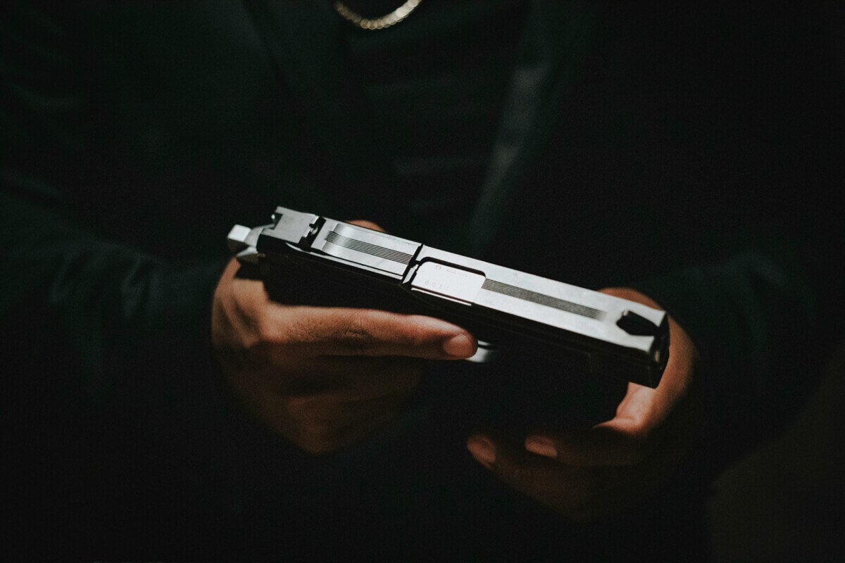 Person holding a gun