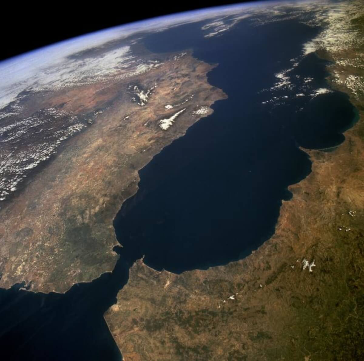 The Strait of Gibraltar provides a natural physical barrier between the countries of Spain (north) and Morocco (south)