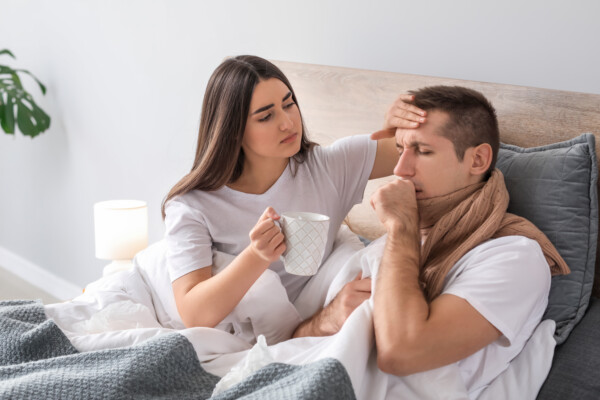 Woman taking care of her sick husband