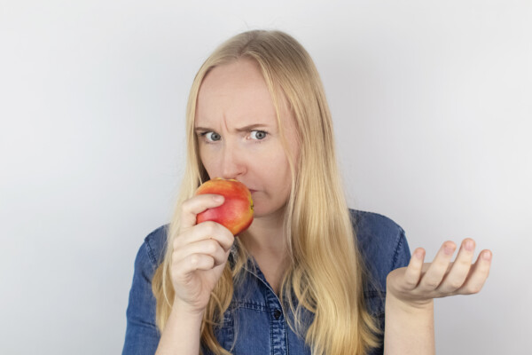 Woman experiencing loss of smell