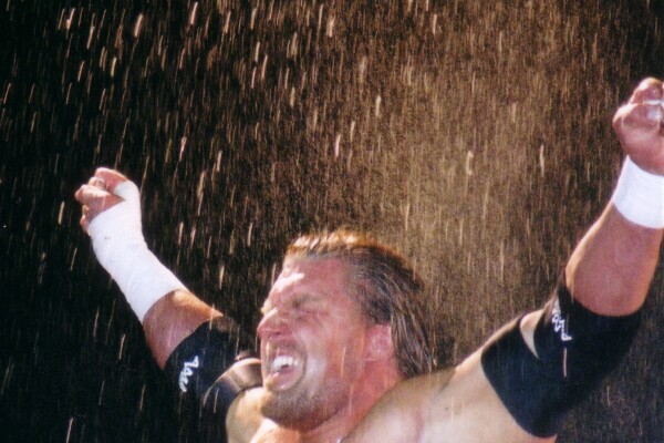 Triple H celebrating a WWE win