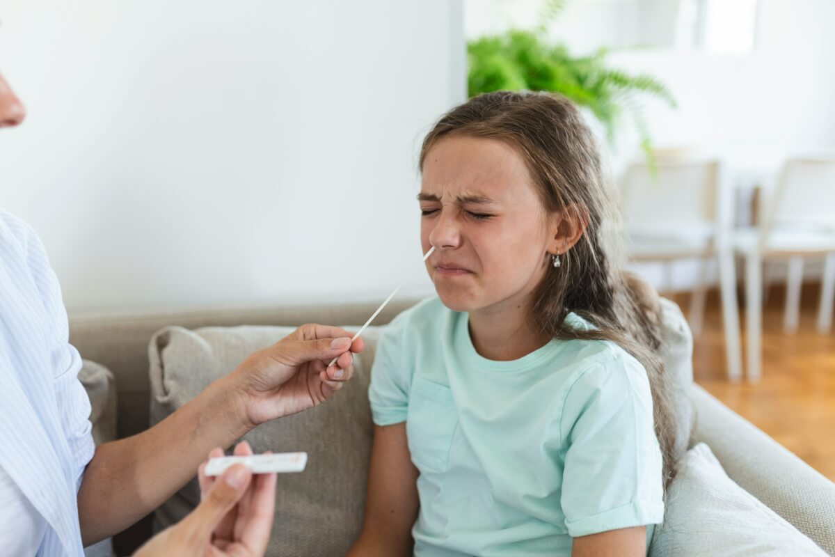 Child getting COVID-19 test