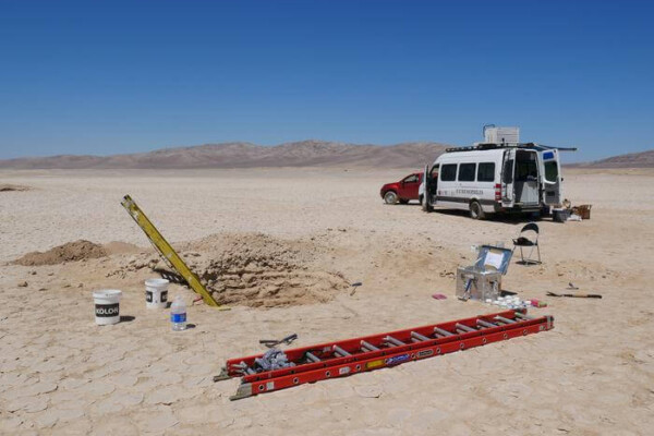 Study site, showing digging works and lab truck discovering hidden desert biosphere