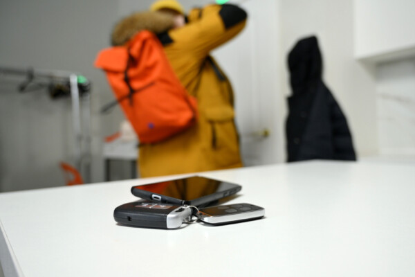 A man in a hurry forgets his keys, wallet, and phone