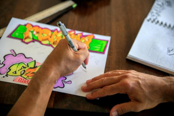 Man Drawing with left hand