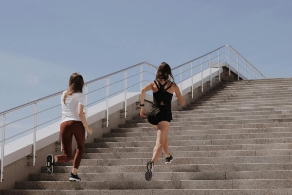 Women Running up Stairs