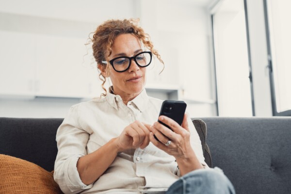 Woman scrolling on her smartphone