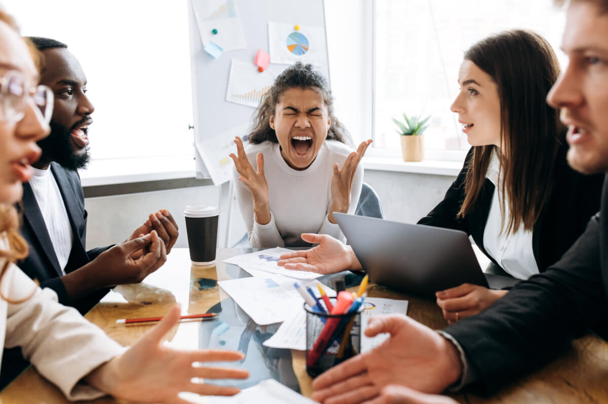 Woman screaming during stressful office meeting