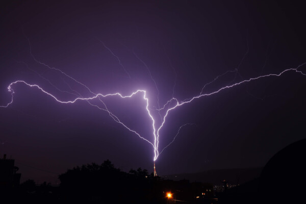 Ground-to-cloud / upward-moving lightning under Tbilisi sky.