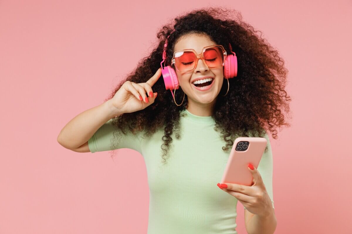 A woman listening to a podcast