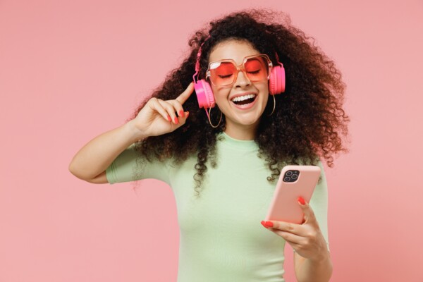 A woman listening to a podcast