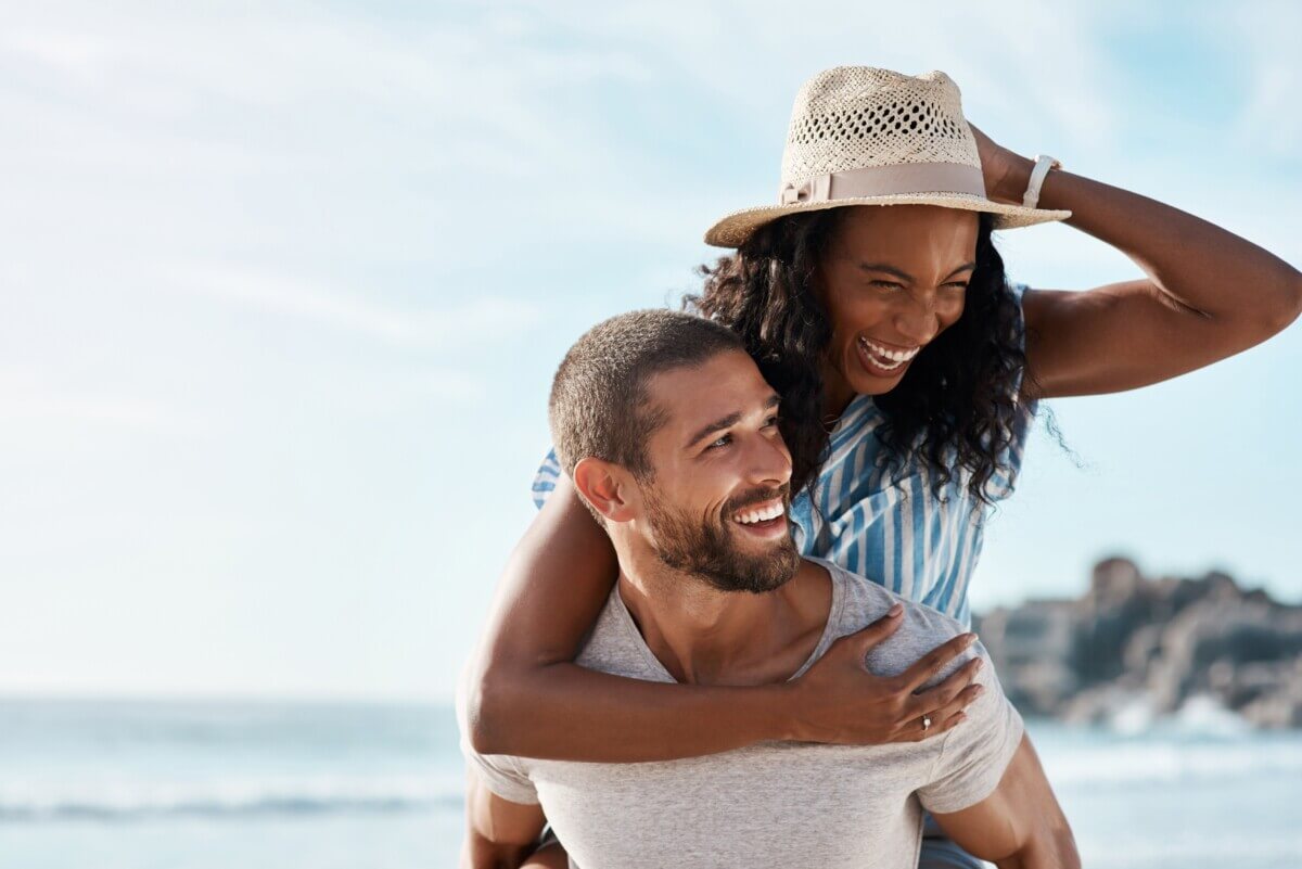 A happy couple on the beach in Cancun