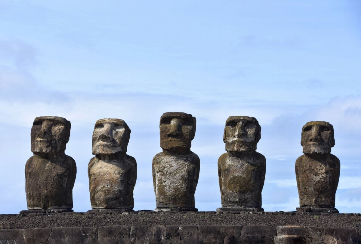 The iconic Moai heads at a Unesco Heritage National Park from Easter Island, Chile.
