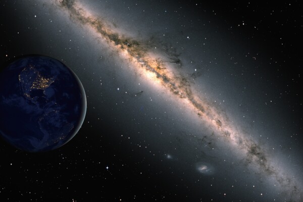 Planet Earth in front of the Milky Way galaxy