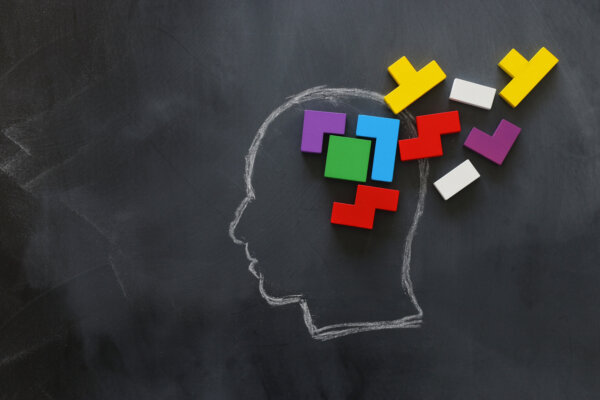 Brain with puzzle pieces depicting mental health or neurological disorder