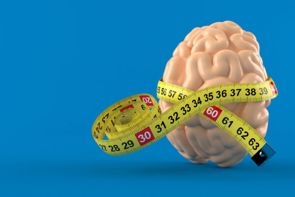 Brain with centimeter measuring tape