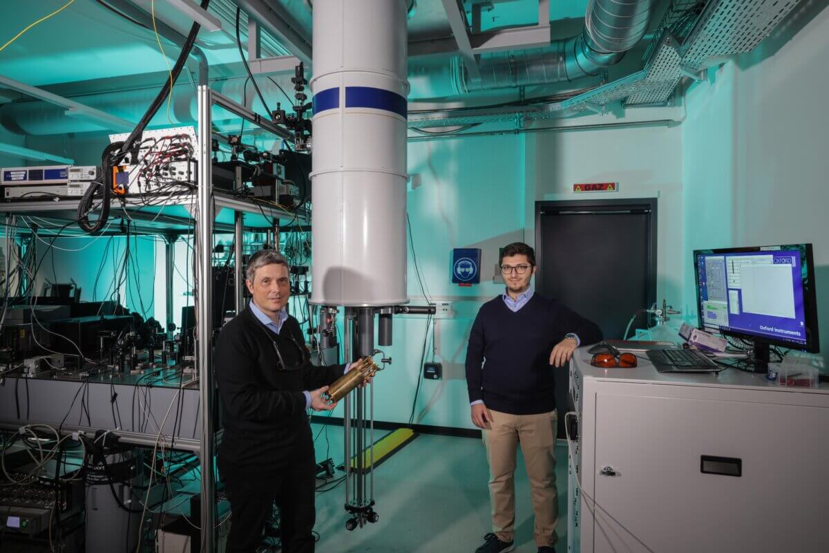 Andras Kis and Gabriele Pasquale with the LANES lab's dilution refrigerator