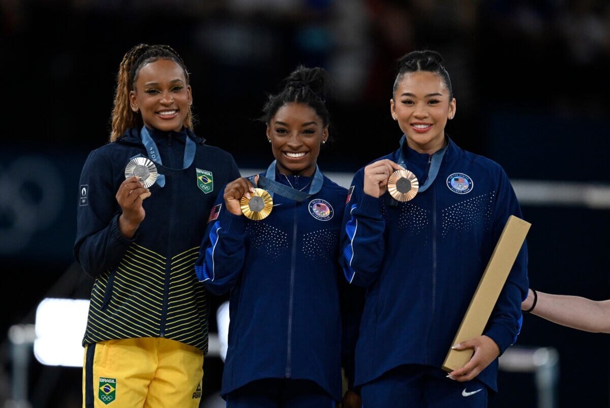 Simone Biles (center) Floor exercise, artistic gymnastics, women's all-around final during the Paris 2024 Olympic Games at the Bercy Arena in Paris, France