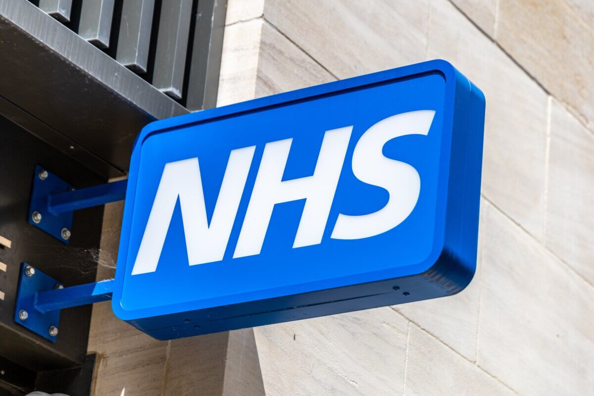 National Health Service (NHS) sign on building in the UK