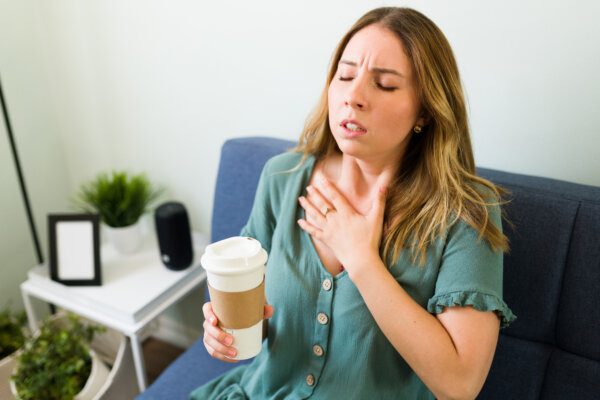 Woman having a bad reaction to caffeine.
