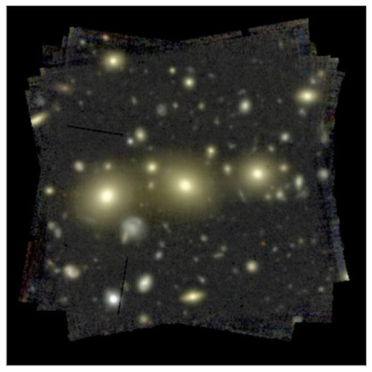 One of the team’s Very Large Telescope images showing massive galaxies in a group. The galaxies at the centre are each about 125 billion times the mass of our sun (including their dark matter). 