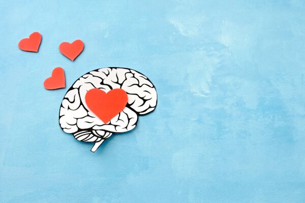 hearts fly out of the brain of a person in love