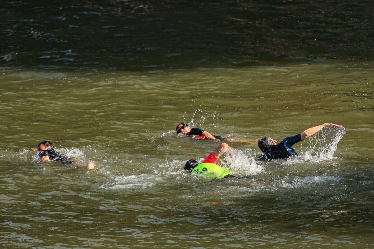 Swimming in the river Seine of Paris just days before the Paris Olympic Games. 