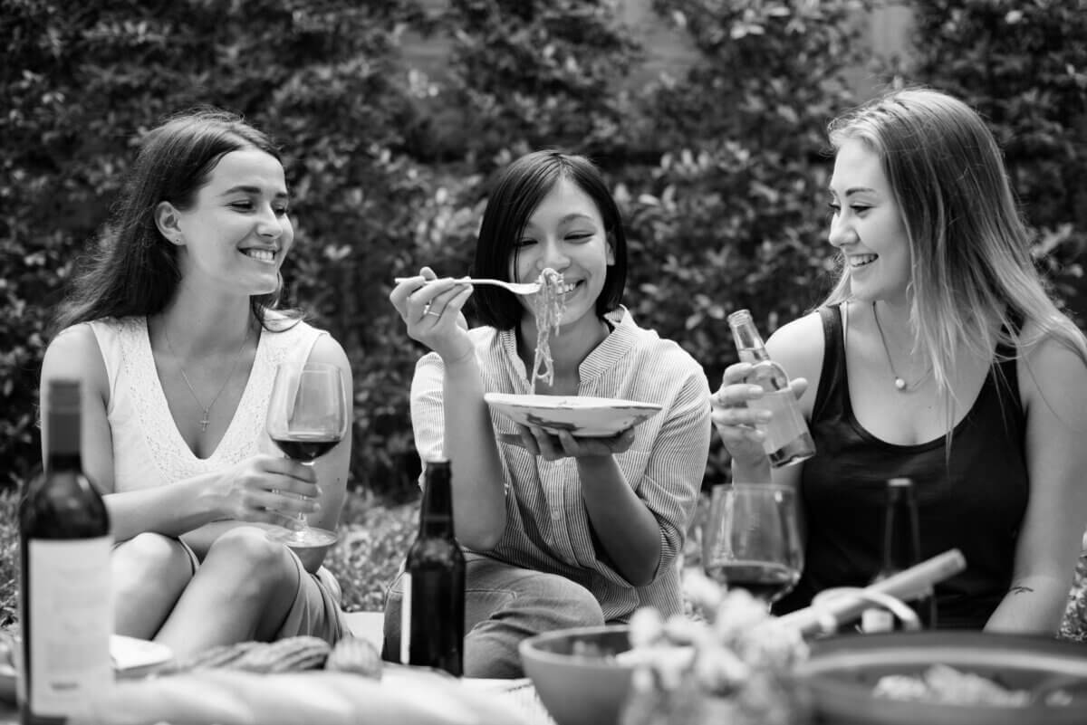 women enjoying food