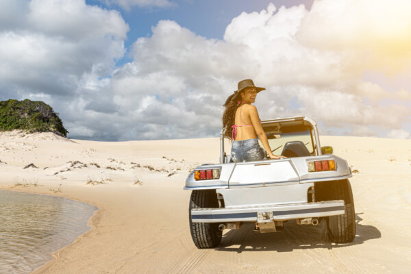 A woman on a dune buggy in Brazil