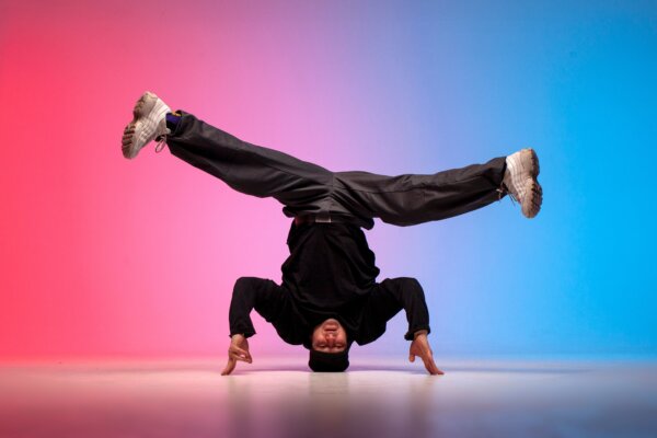 young guy hiphop performer break dancing