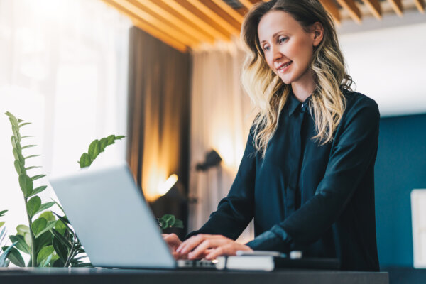 Woman working at her standing desk