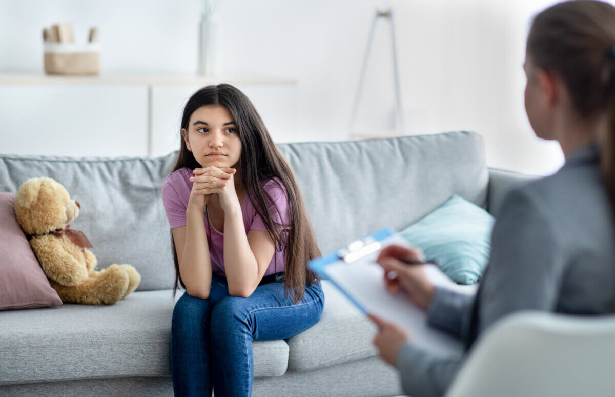 Female Psychologist with child patient