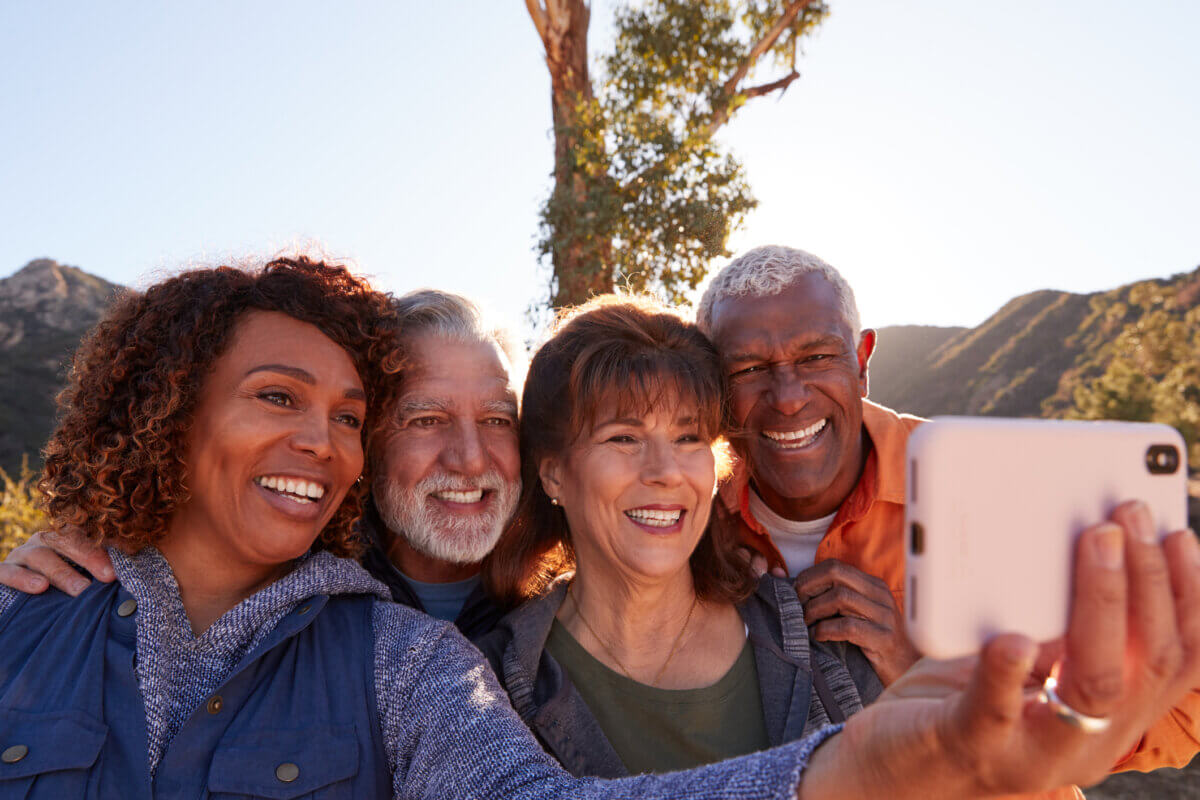 Friendship for life: Senior friends taking selfie